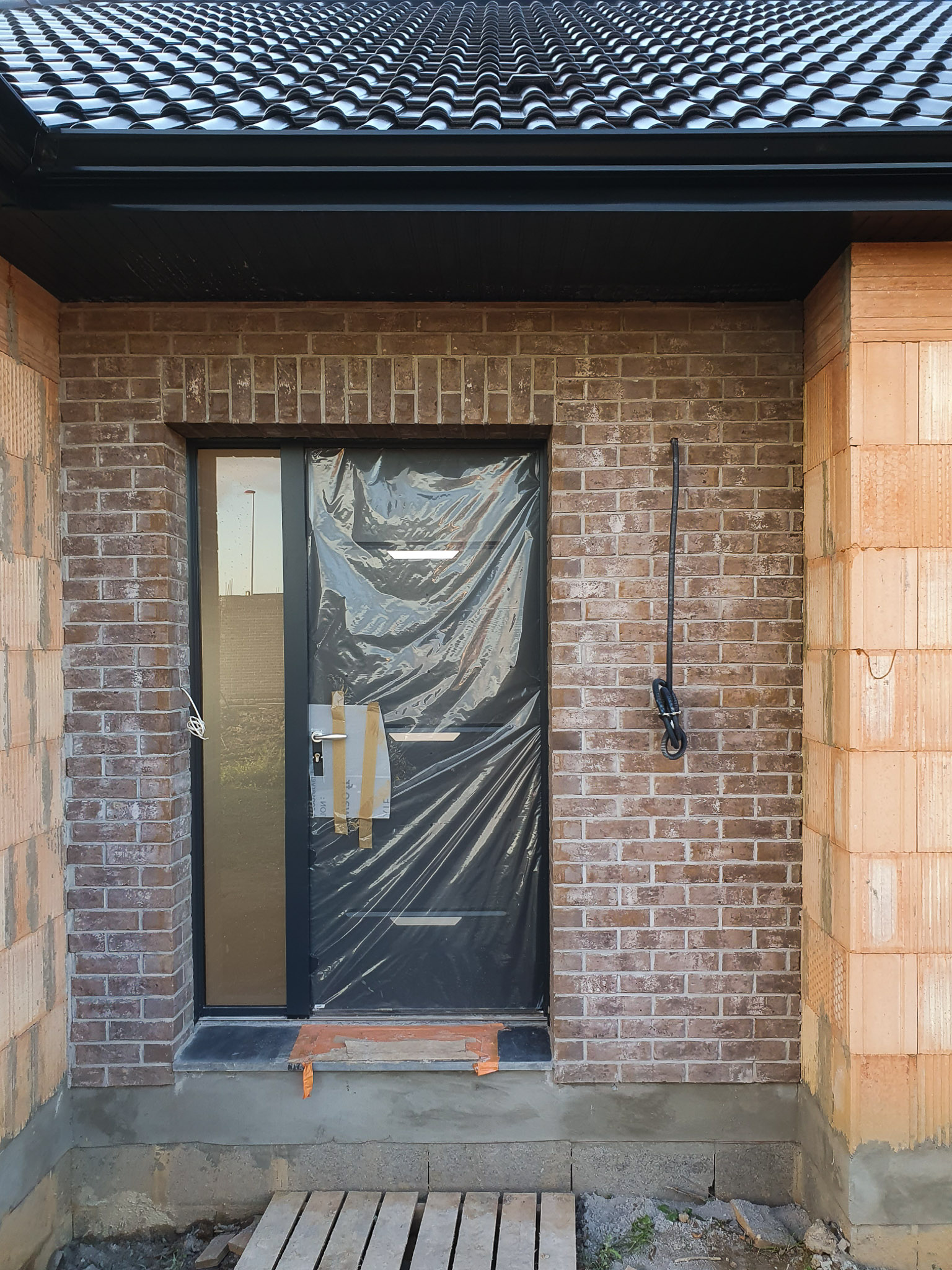 Contours de porte d'entrée en briquette à Gien